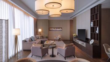 Regency, Executive Suite | Living area | 65-inch Smart TV with satellite channels, TV