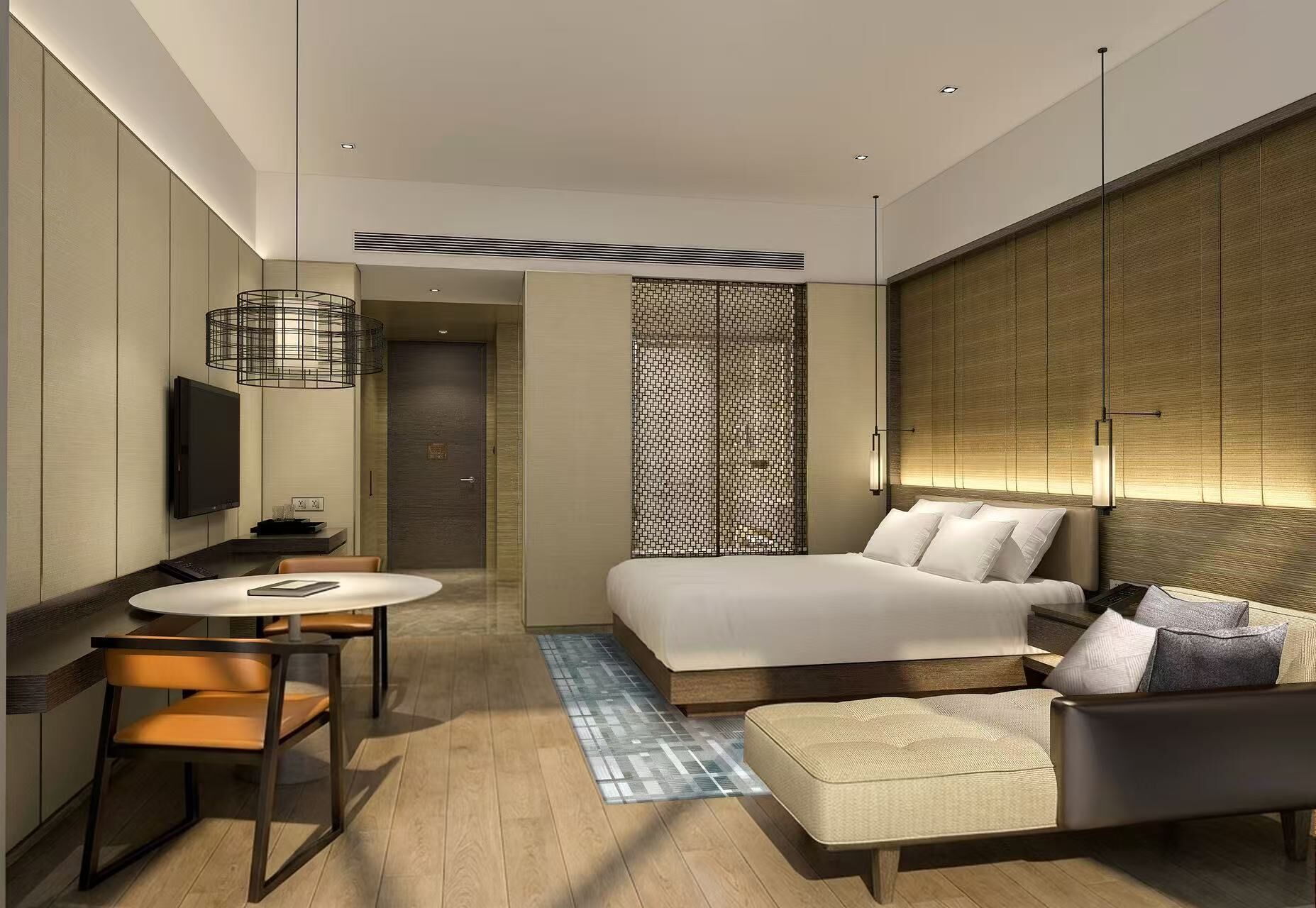 A modern hotel room with a bed, a desk, a chair, a TV, and a patterned wall.