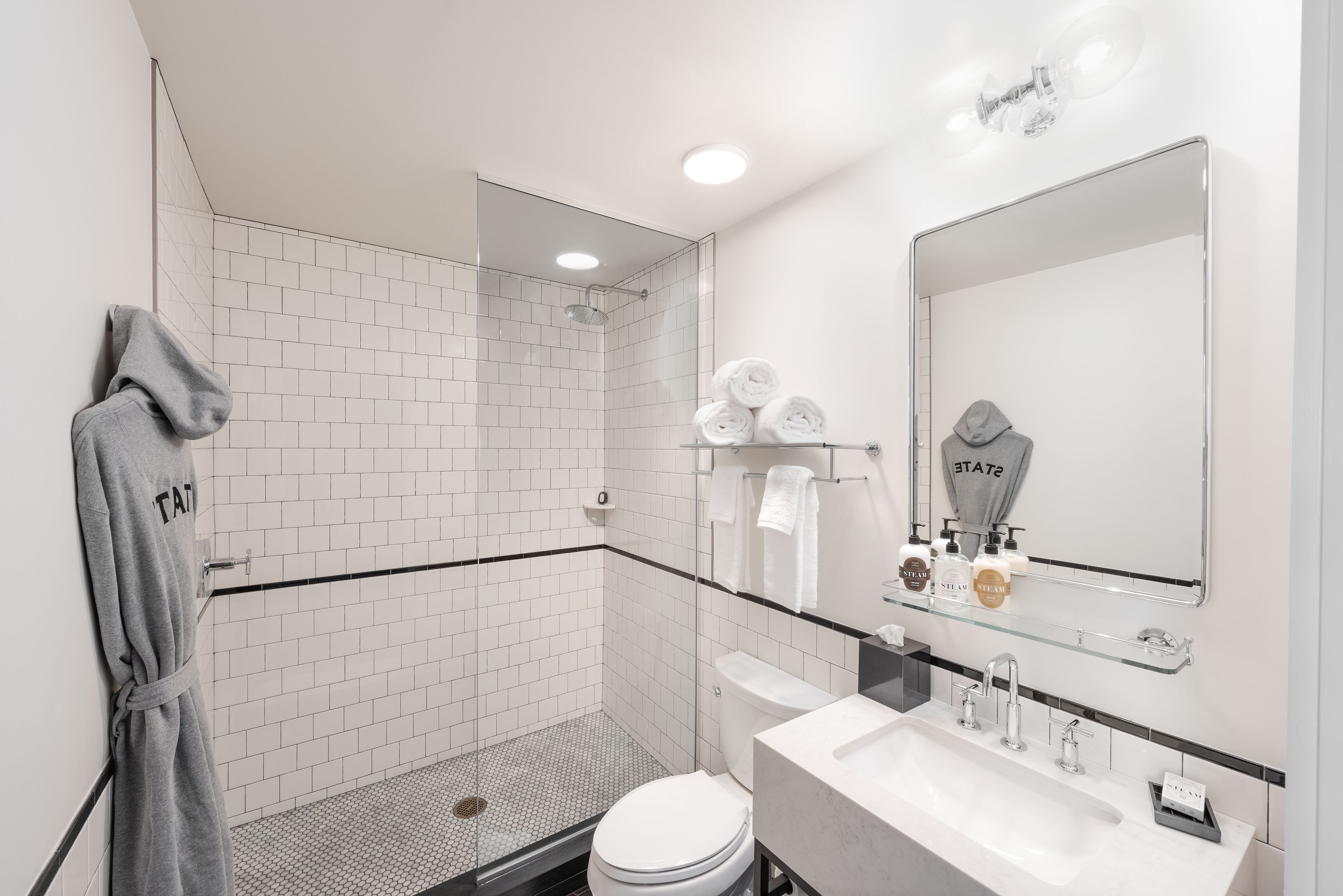 room, 1 king bed | bathroom | shower, designer toiletries, hair dryer, bathrobes