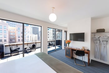 Suite, 1 King Bed, Mobility Accessible, Terrace | Desk, blackout drapes, soundproofing, iron/ironing board at The State Hotel