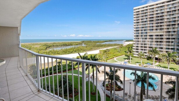 Property grounds - Beachfront 2BR condo with pool, WiFi, and cool comfort in Marco Island. (Marco Island)