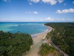 On the beach, sun loungers, beach towels