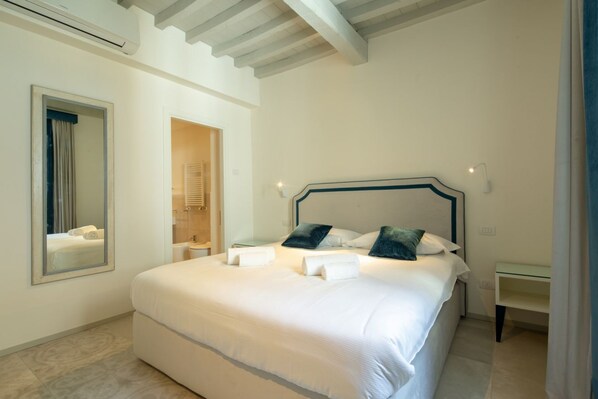 1 غرفة نوم ومكواة/لوح كي وواي فاي وملاءات أسرّة