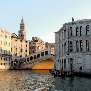 Spanning a tranquil canal, this historic bridge connects two sides of the city, offering a glimpse into classic European architecture.