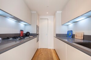 Fridge, microwave, dishwasher, cookware/dishes/utensils