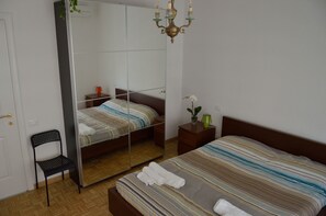 2 habitaciones, tabla de planchar con plancha, wifi y ropa de cama