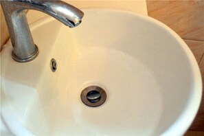 Shower, free toiletries, hair dryer, slippers