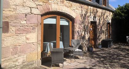 Detached coach house in grounds of listed Manse, Pittenweem