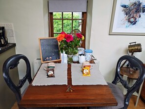 Dining - 1 bedroom historic barn conversion on smallholding with alpacas, goats and pigs (Lanner,)
