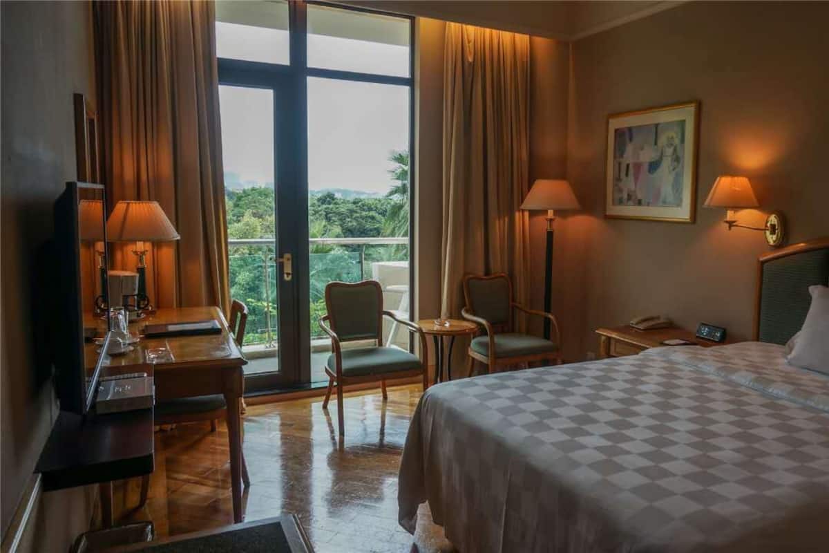Standard Double Room, 1 Double Bed, Smoking | Minibar, in-room safe, desk, blackout drapes