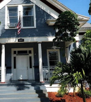 A two-story house with a front porch, white columns, and a front door. - FIFA World Cup 2026- Special Offer! (Fort Myers)