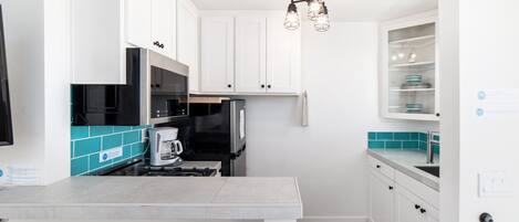Ocean view kitchen off living room
