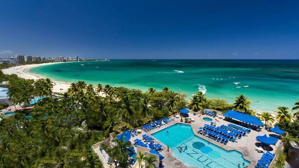 A resort with a swimming pool, beach, and ocean view. - GORGEOUS 2BD/2 BATH ON THE BEACH! DESIGNER APT.LUX! BEST LOCATION. (Cangrejo Arriba)