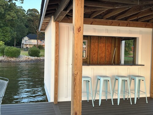 Spectacular Main Lake Sunsets from spacious 4 BR, 3800 sq ft, 1-acre point lot