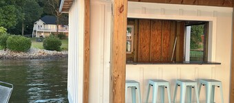 Spectacular Main Lake Sunsets from spacious 4 BR, 3800 sq ft, 1-acre point lot