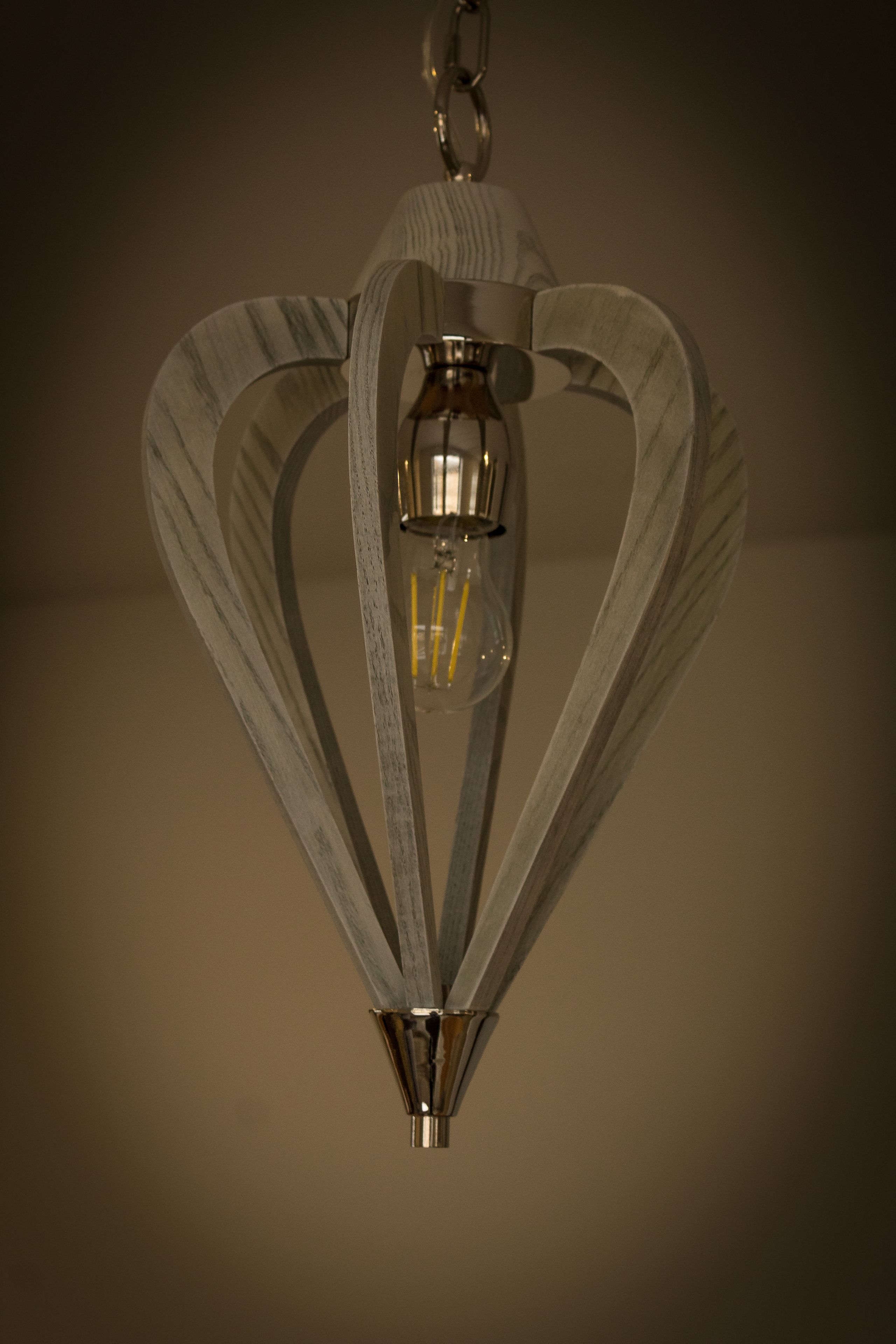 A chandelier with a unique heart-shaped design.