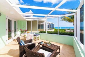 Outdoor dining - Sea Biscuit 1BR Oceanfront at The Sea Lodges (Cayman Kai)