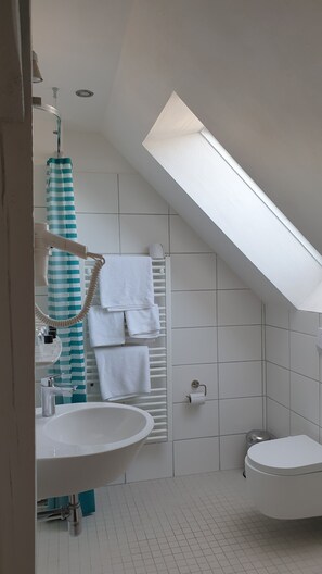 Shower, hair dryer, soap, shampoo