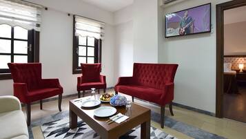 Family Suite, Garden View | Living area | LCD TV