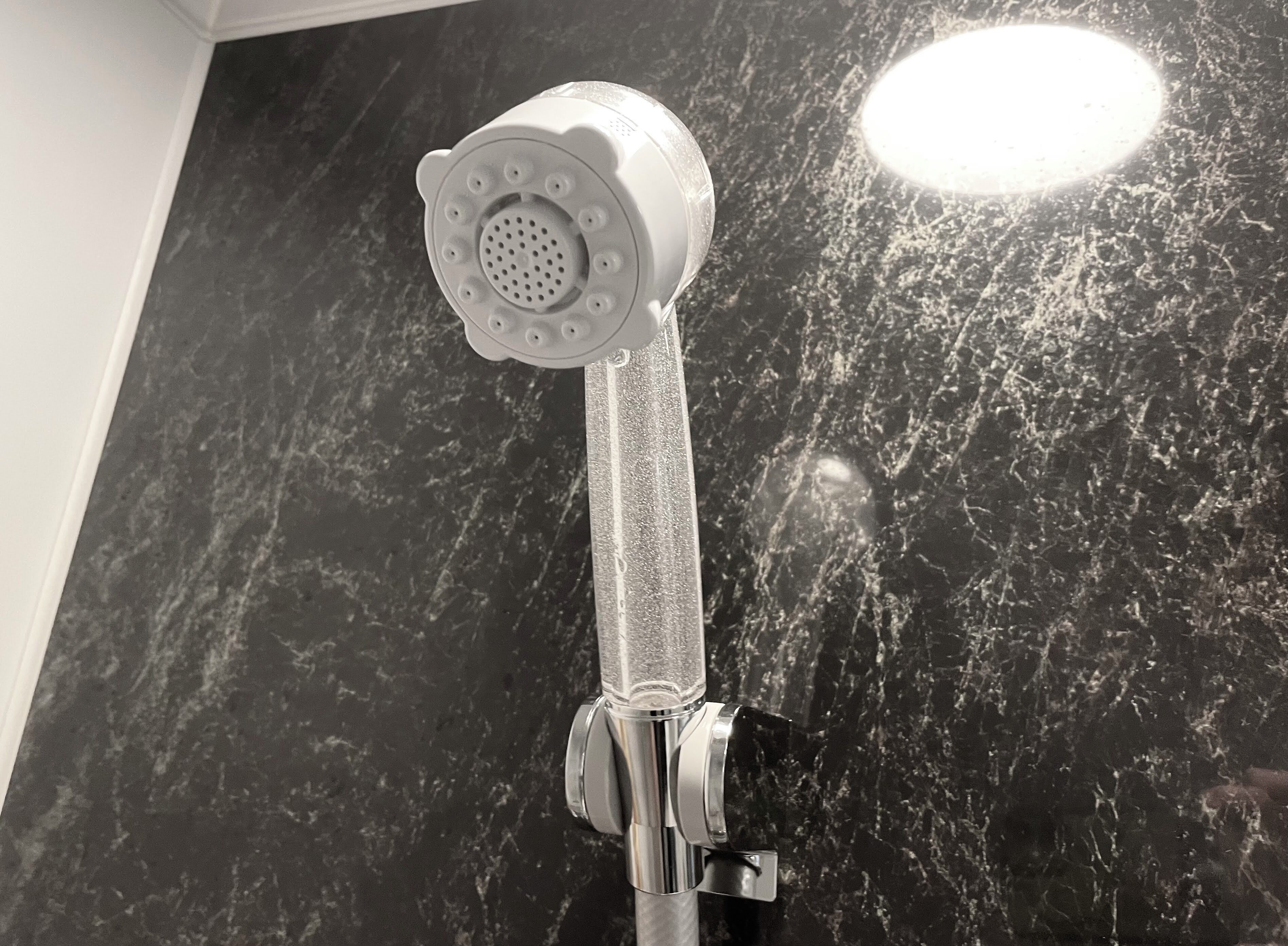 combined shower/bathtub, hair dryer, slippers, electronic bidet