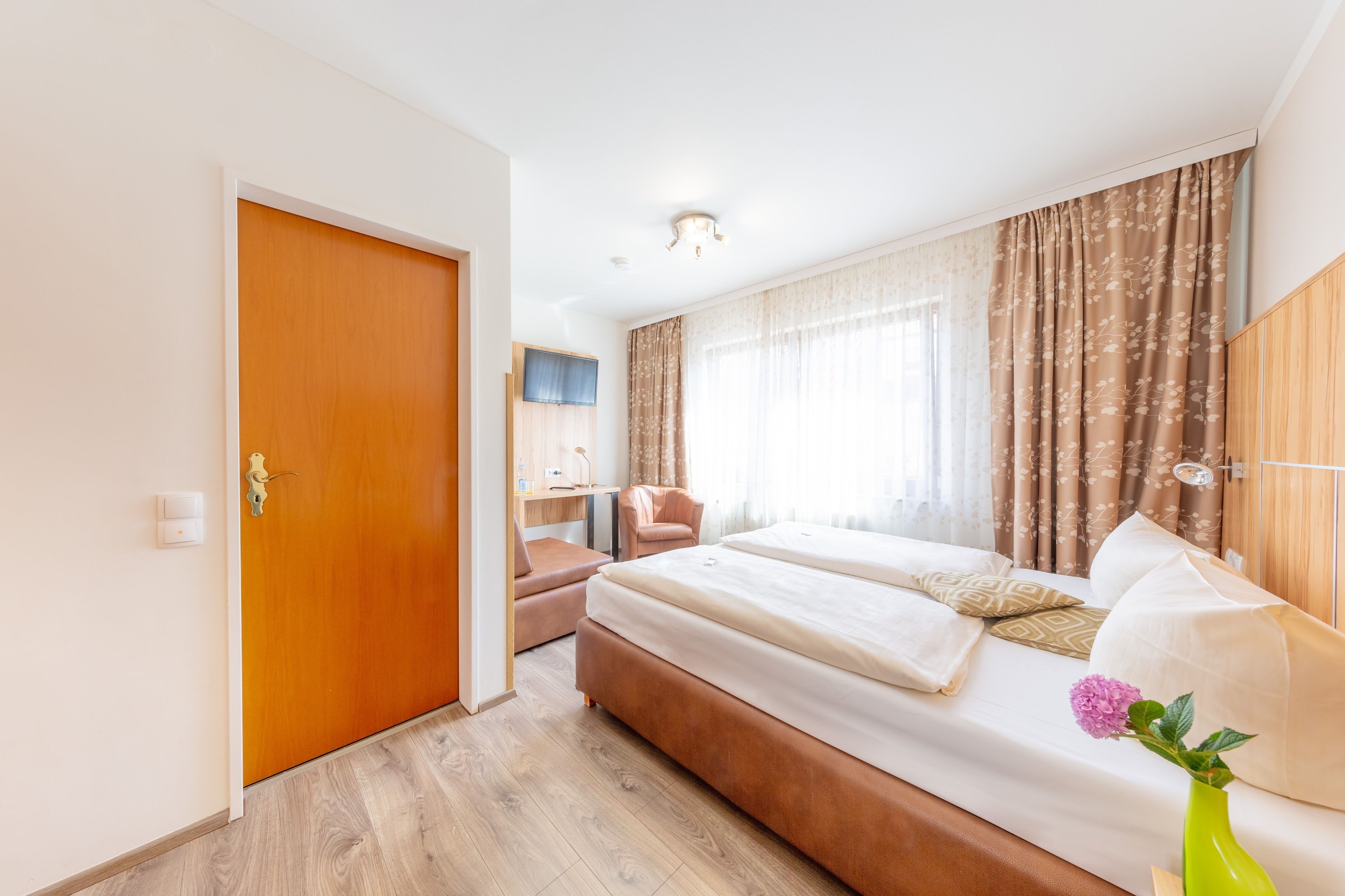 hypo-allergenic bedding, desk, blackout curtains, soundproofing