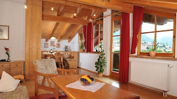 Apartment, Balcony, Mountain View | Living area | Flat-screen TV