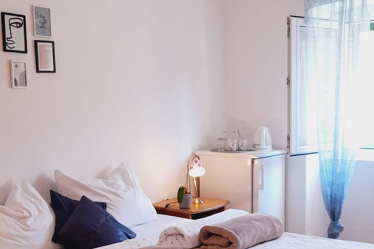 Double Room, Partial Sea View | Desk, iron/ironing board, free cots/infant beds, free rollaway beds
