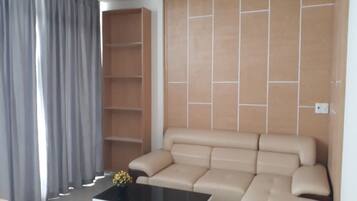 Executive Apartment, 1 Bedroom | Living area | Flat-screen TV