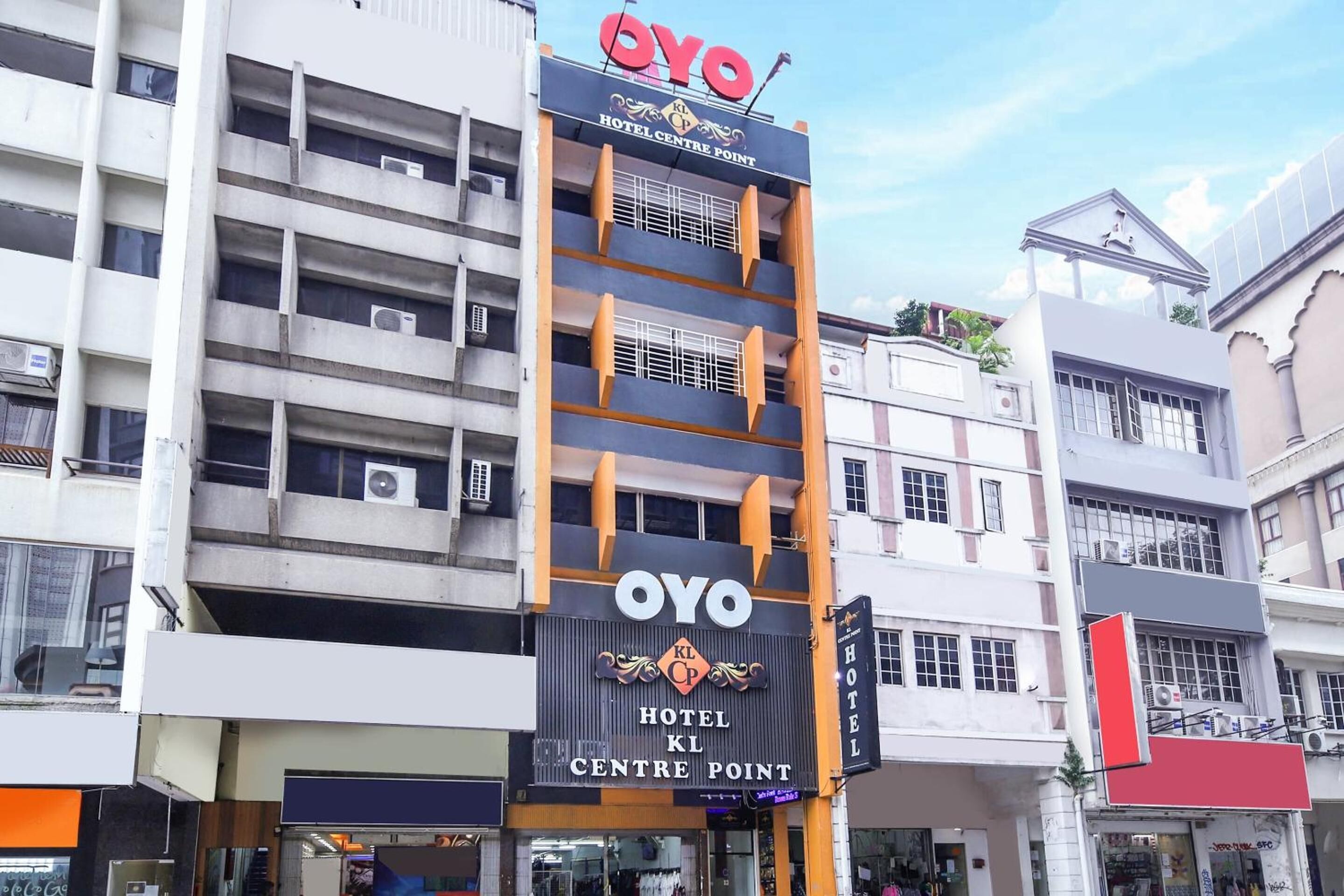 A hotel building with a prominent sign for 'OYO Hotel KL Centre Point.'