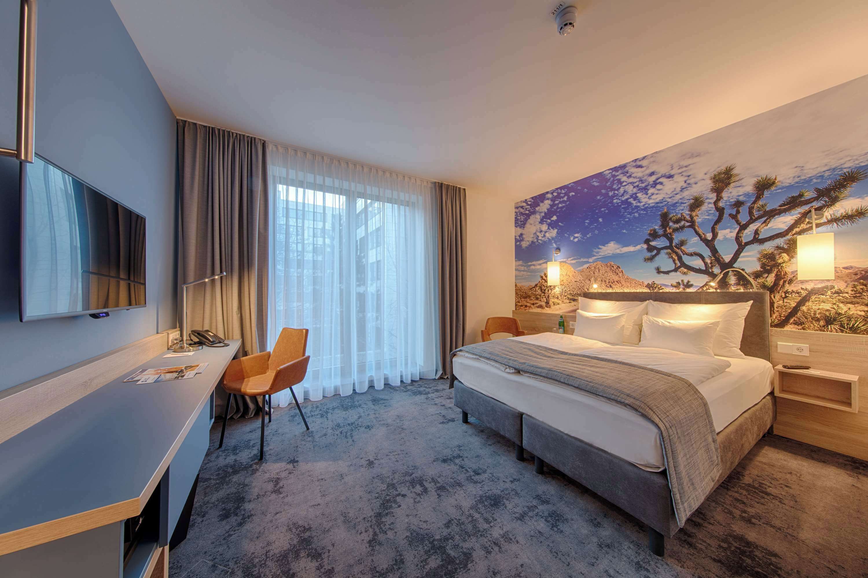 Comfort-værelse - 1 kingsize-seng (Larger Room) | Premium-sengetøj, pengeskab på værelset