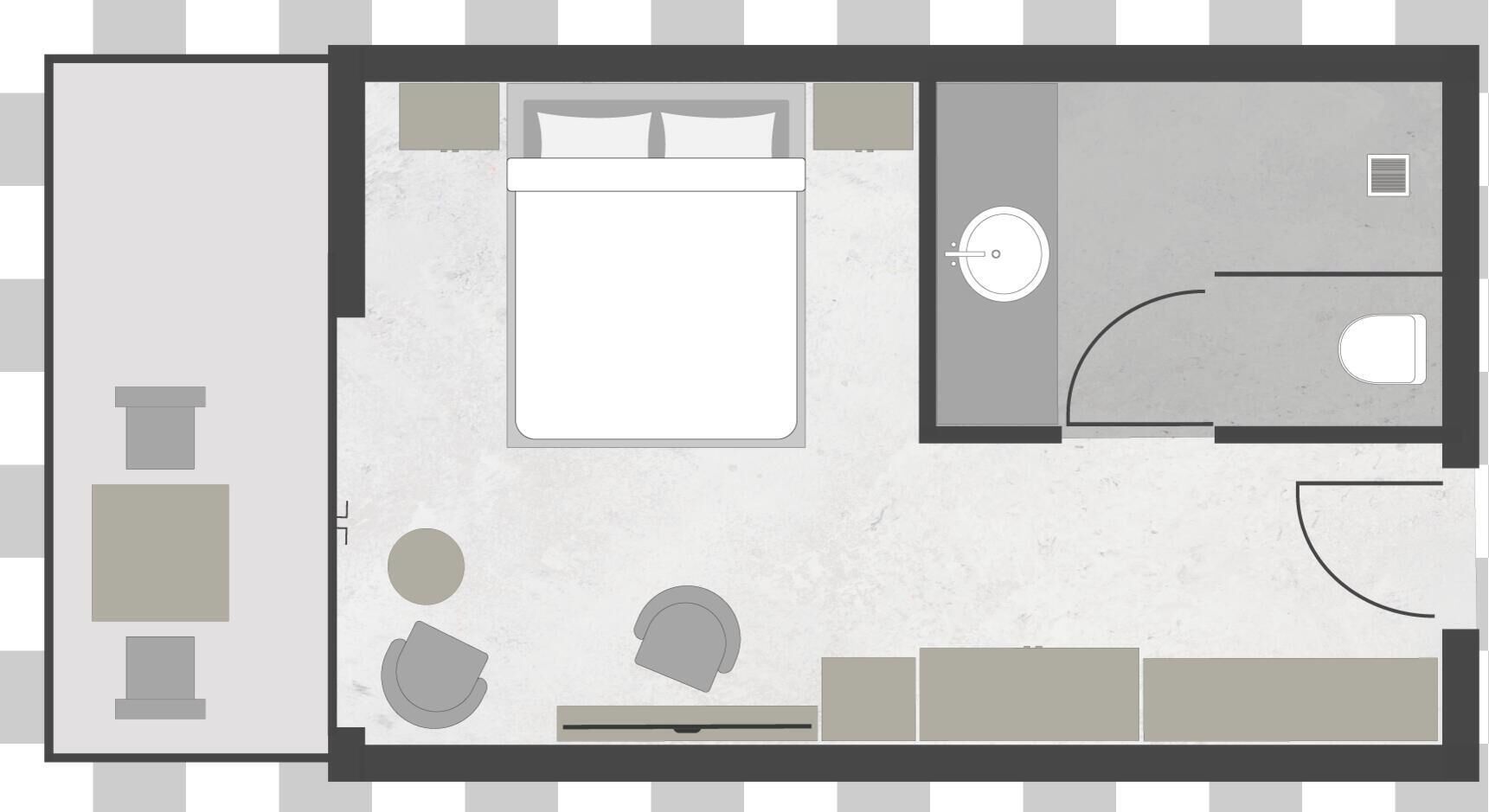 A hotel room layout with a bed, a small bathroom, a seating area, and a dining table.