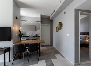 Deluxe Balcony One Bedroom Suite with Private Safe Room (Mamad) | In-room dining