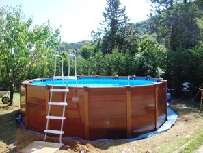 Outdoor pool, pool umbrellas, pool loungers