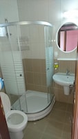 Ducha, secador de pelo, toallas