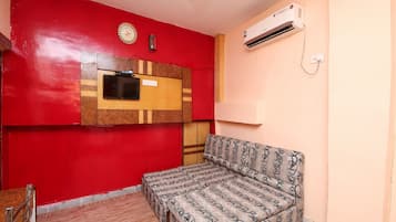 Double or Twin Room | Living area | TV