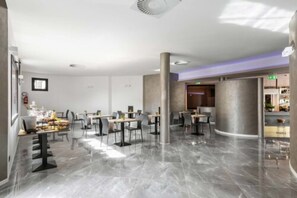 Enjoy a casual dining experience in our spacious dining area with comfortable seating and ample room to move.