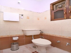 Ducha, artículos de tocador gratuitos, toallas