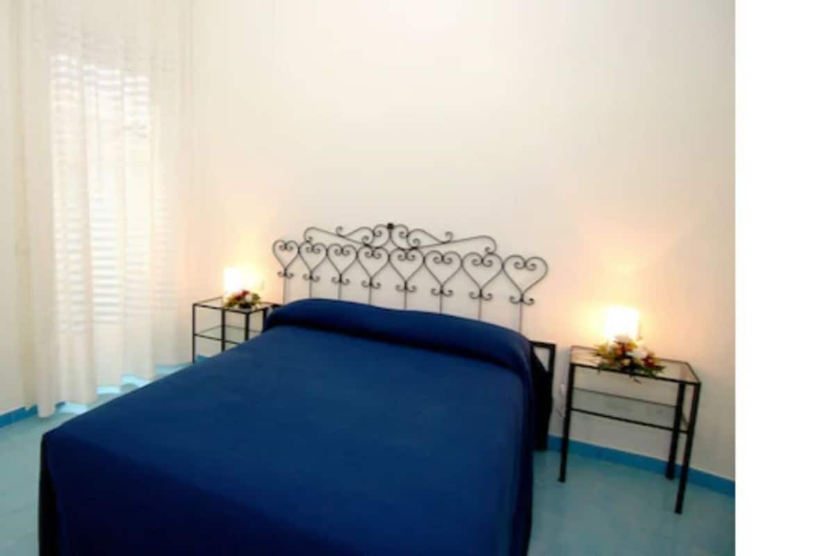 Basic Apartment, Patio | Egyptian cotton sheets, premium bedding, in-room safe, desk
