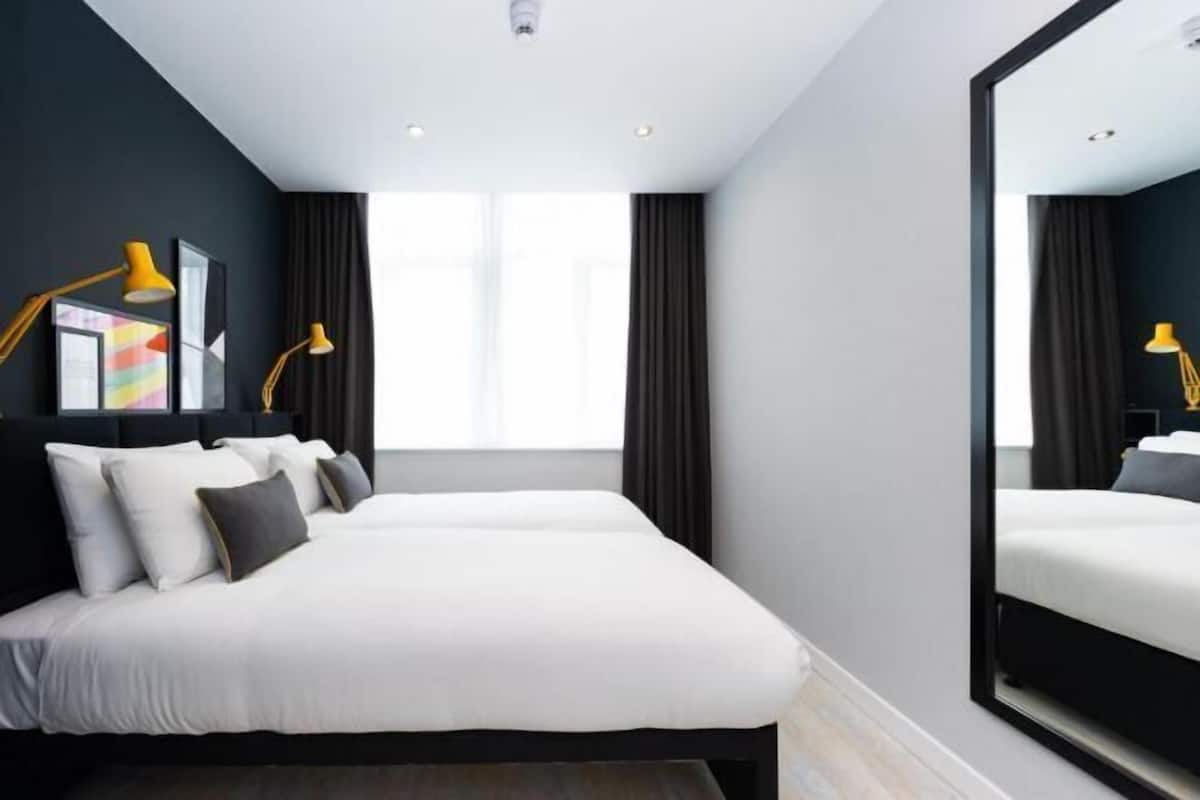 Premium bedding, desk, blackout curtains, iron/ironing board