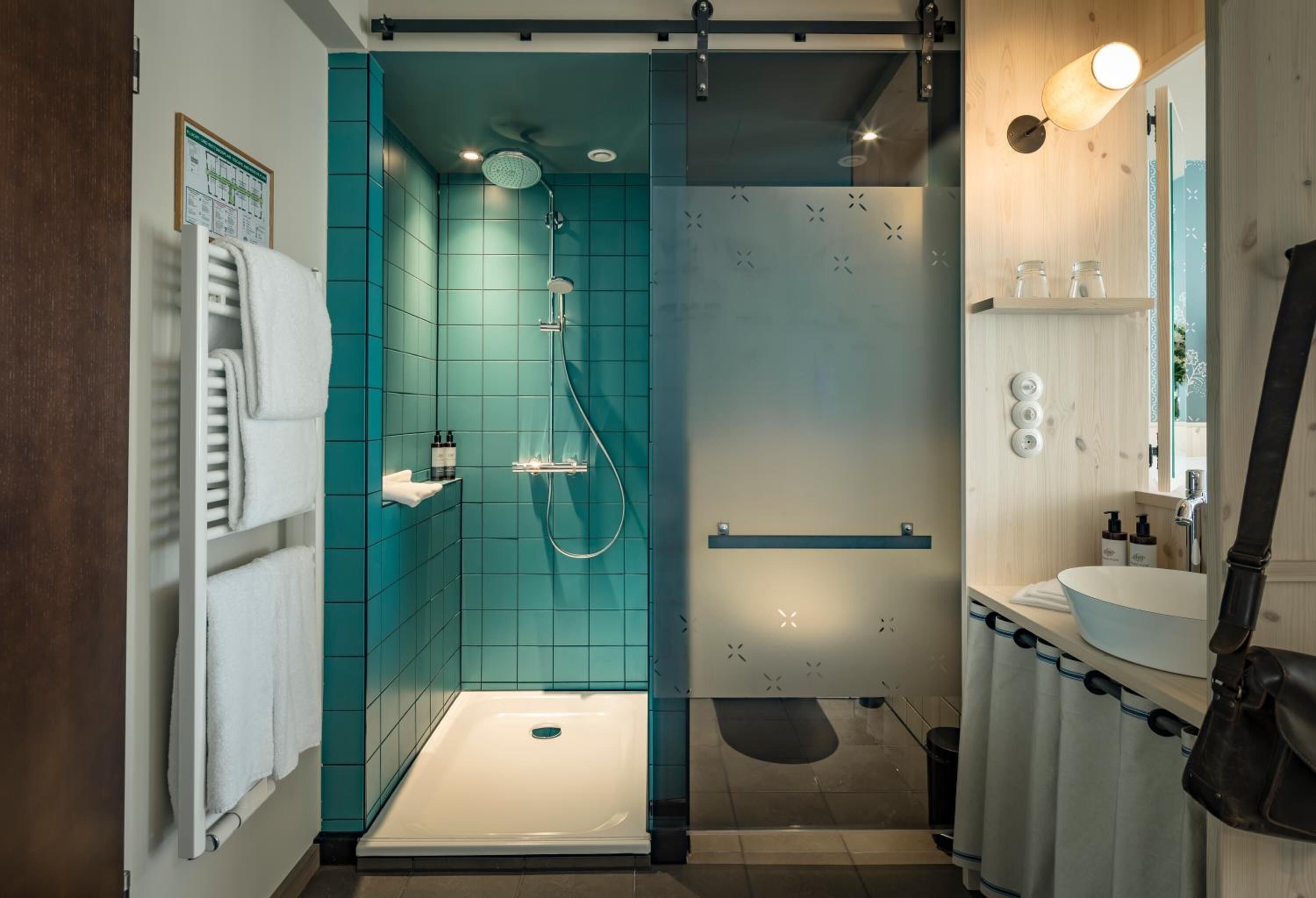 shower, free toiletries, hair dryer, bathrobes