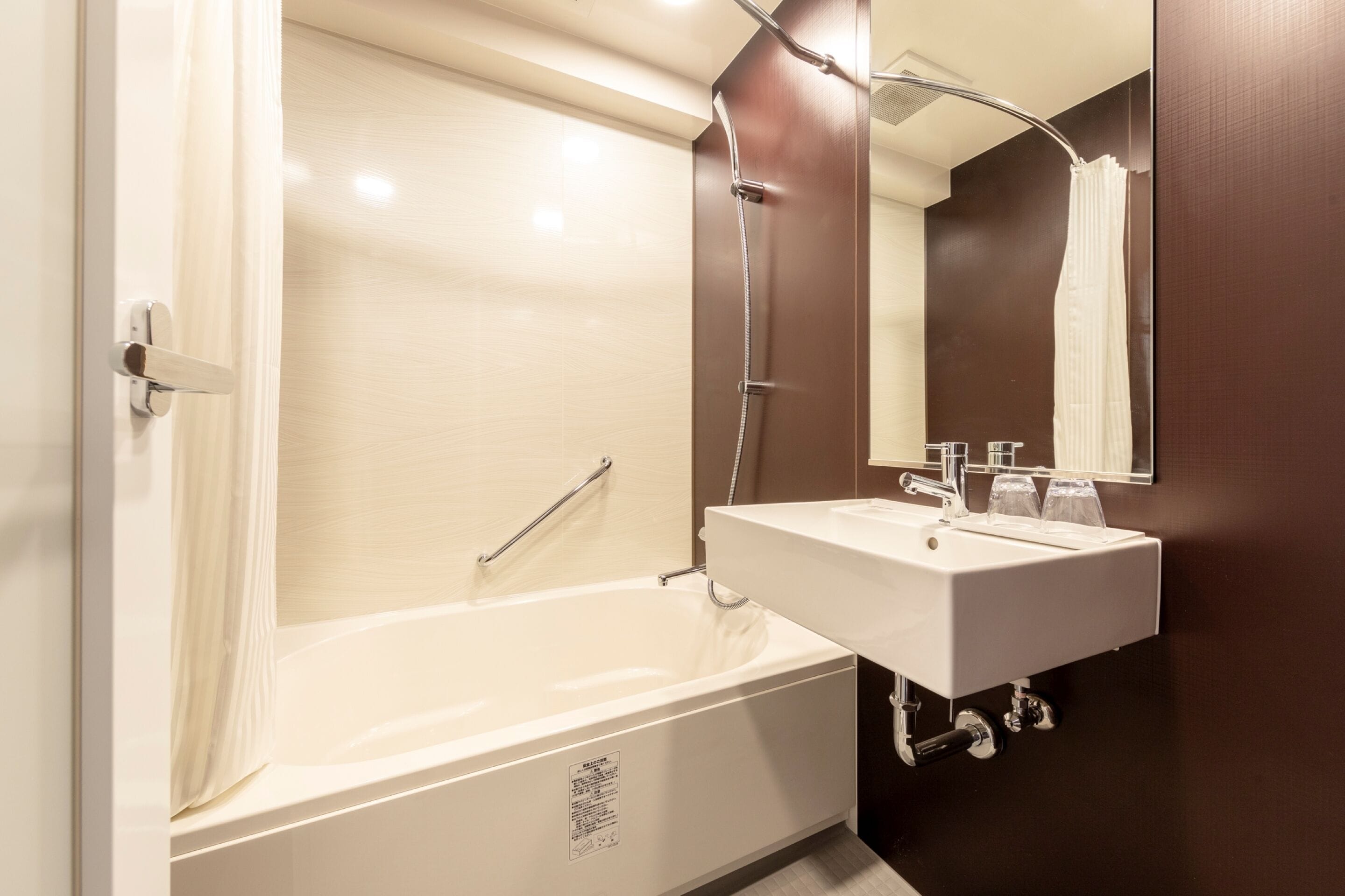 hair dryer, slippers, electronic bidet, towels