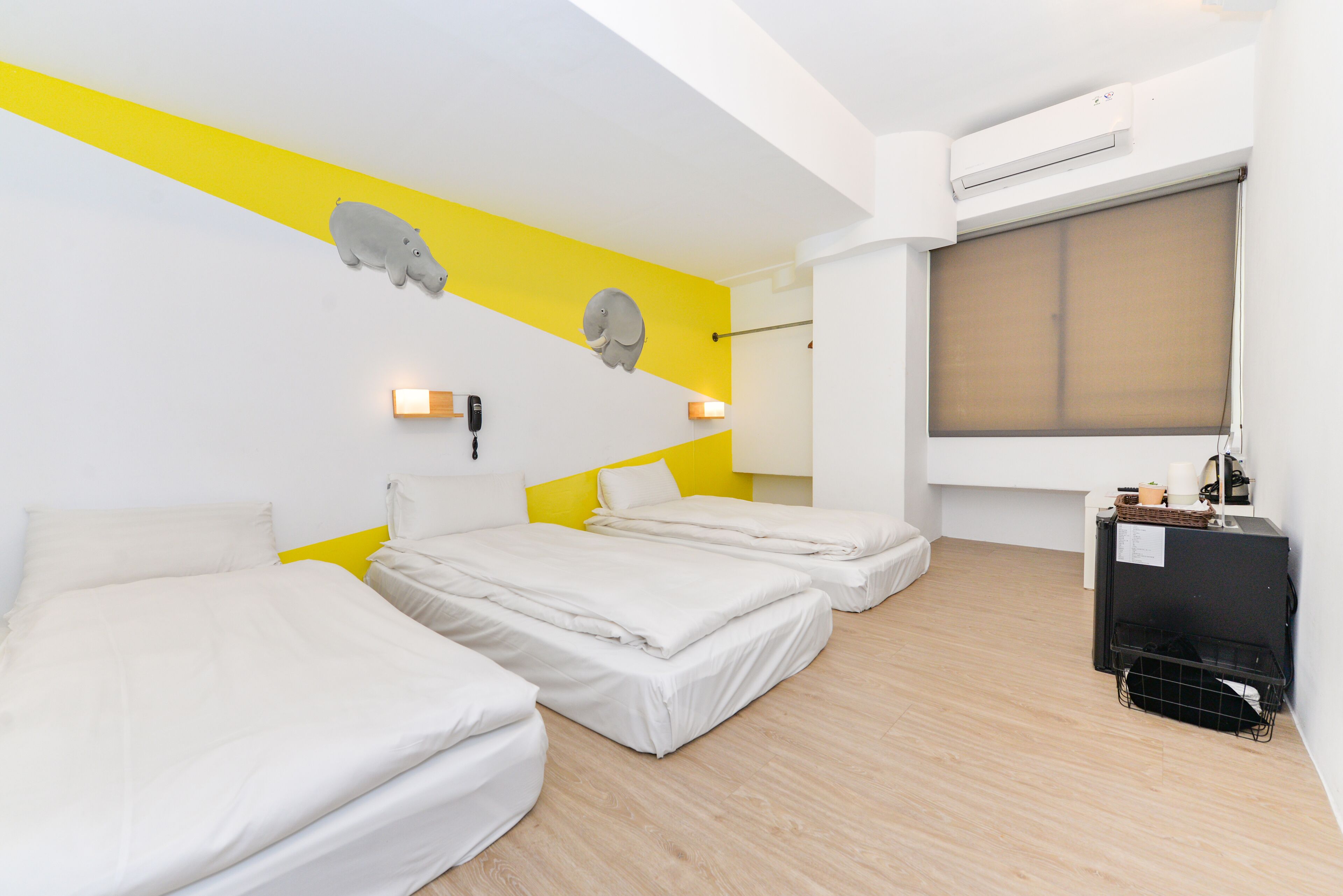 basic triple room, 3 single beds | view from room