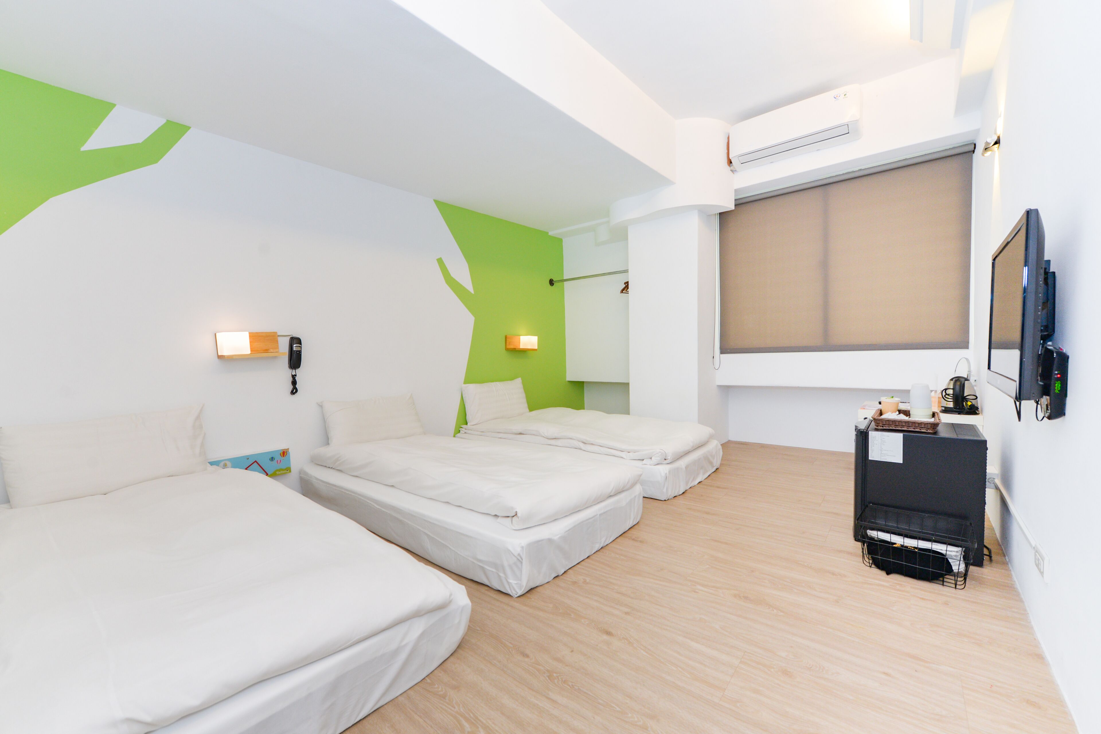 basic triple room, 3 single beds | view from room