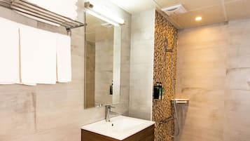 Shower, free toiletries, hair dryer, slippers