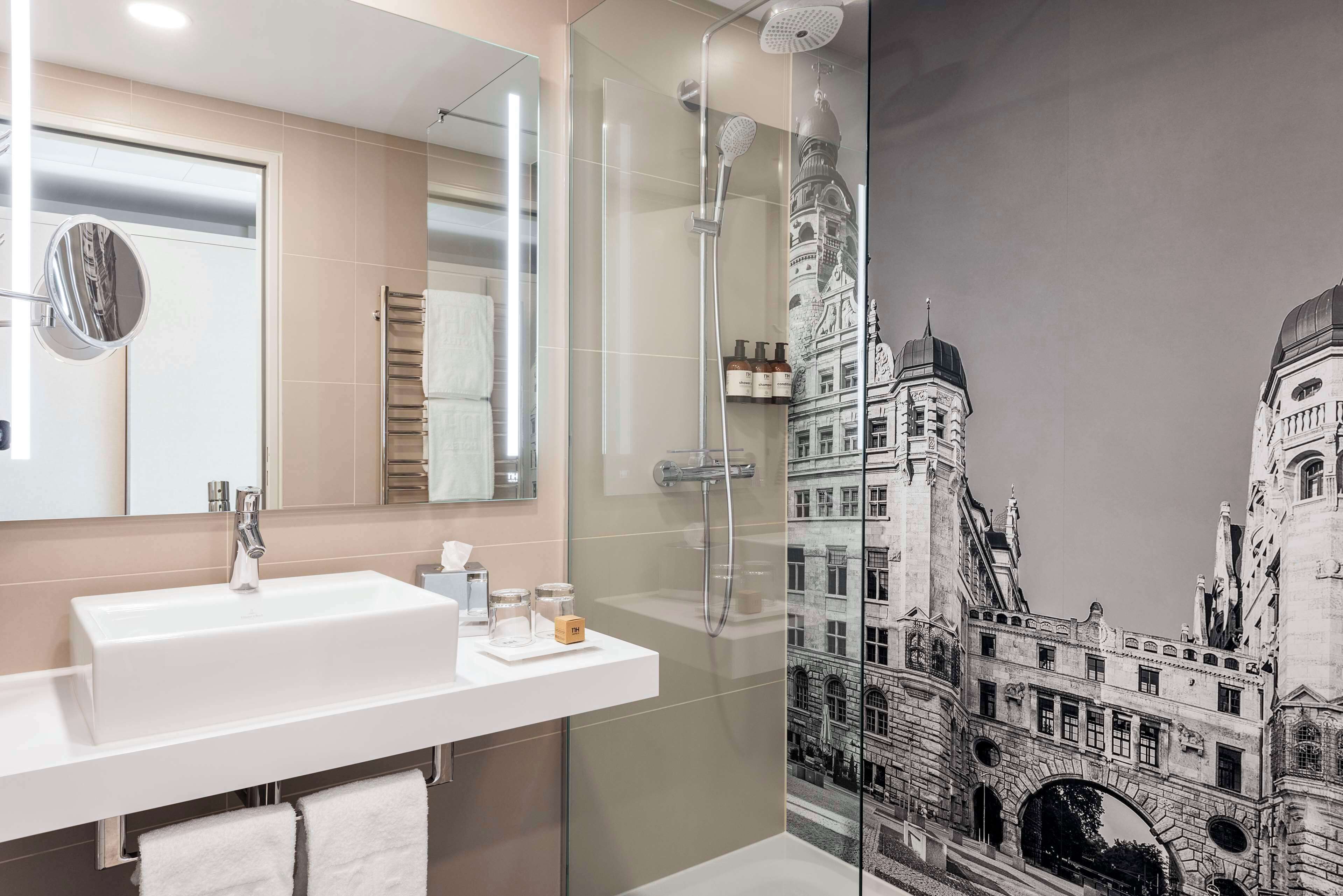 eco-friendly toiletries, hair dryer, towels