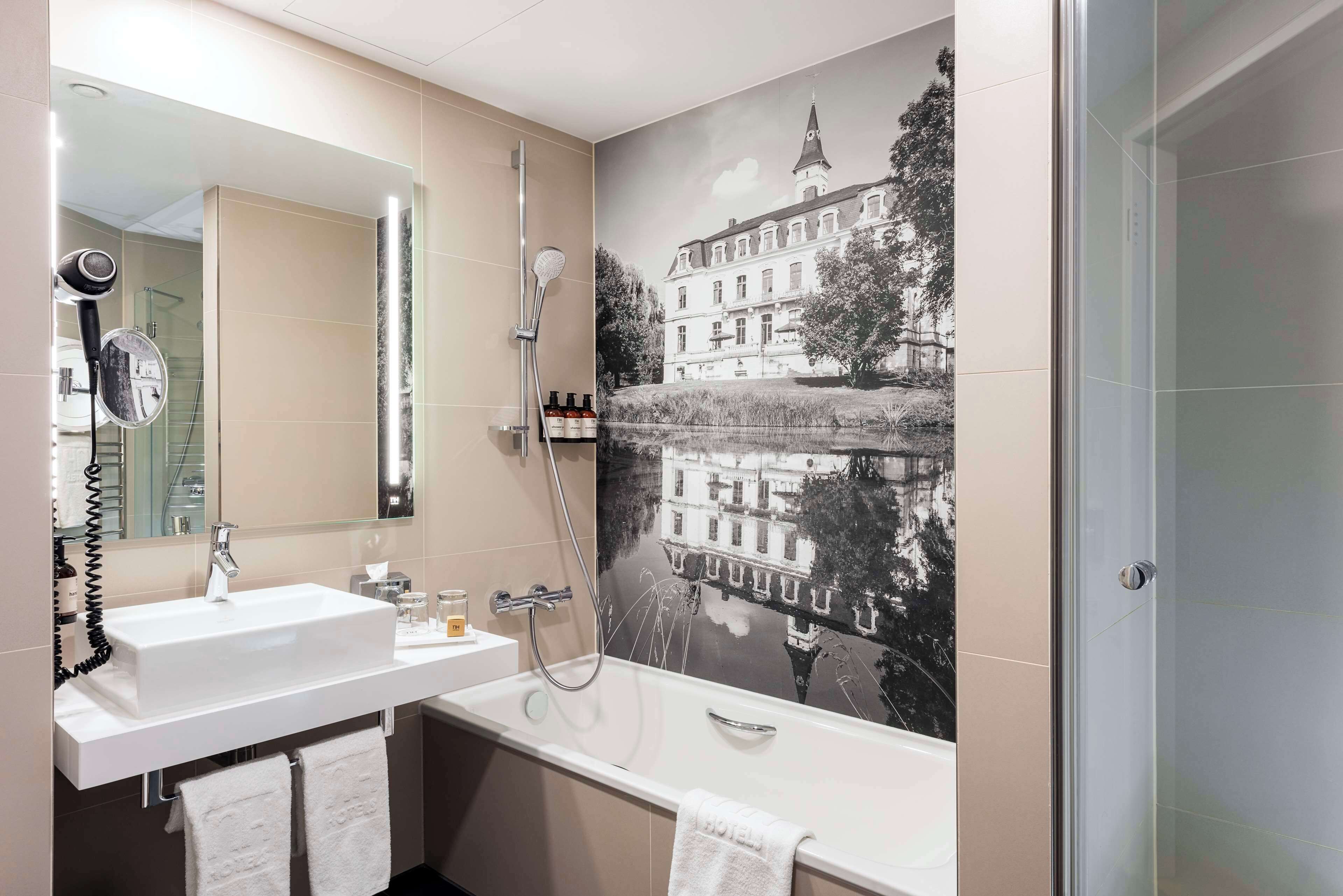 eco-friendly toiletries, hair dryer, towels