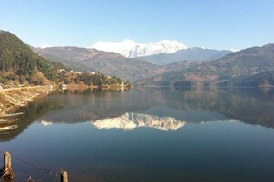 Quarto | Vista para a montanha