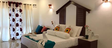 Egyptian cotton sheets, premium bedding, minibar, in-room safe