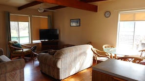 Double or Twin Room | Living room | Flat-screen TV, DVD player