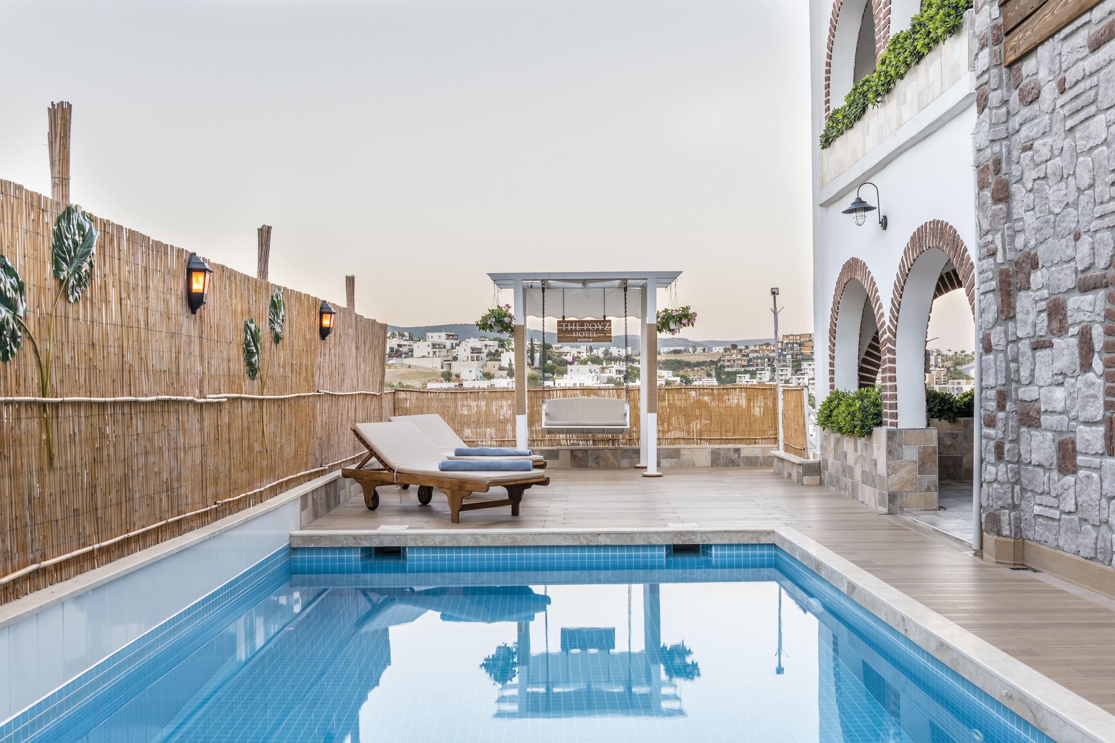 outdoor pool, pool umbrellas, pool loungers